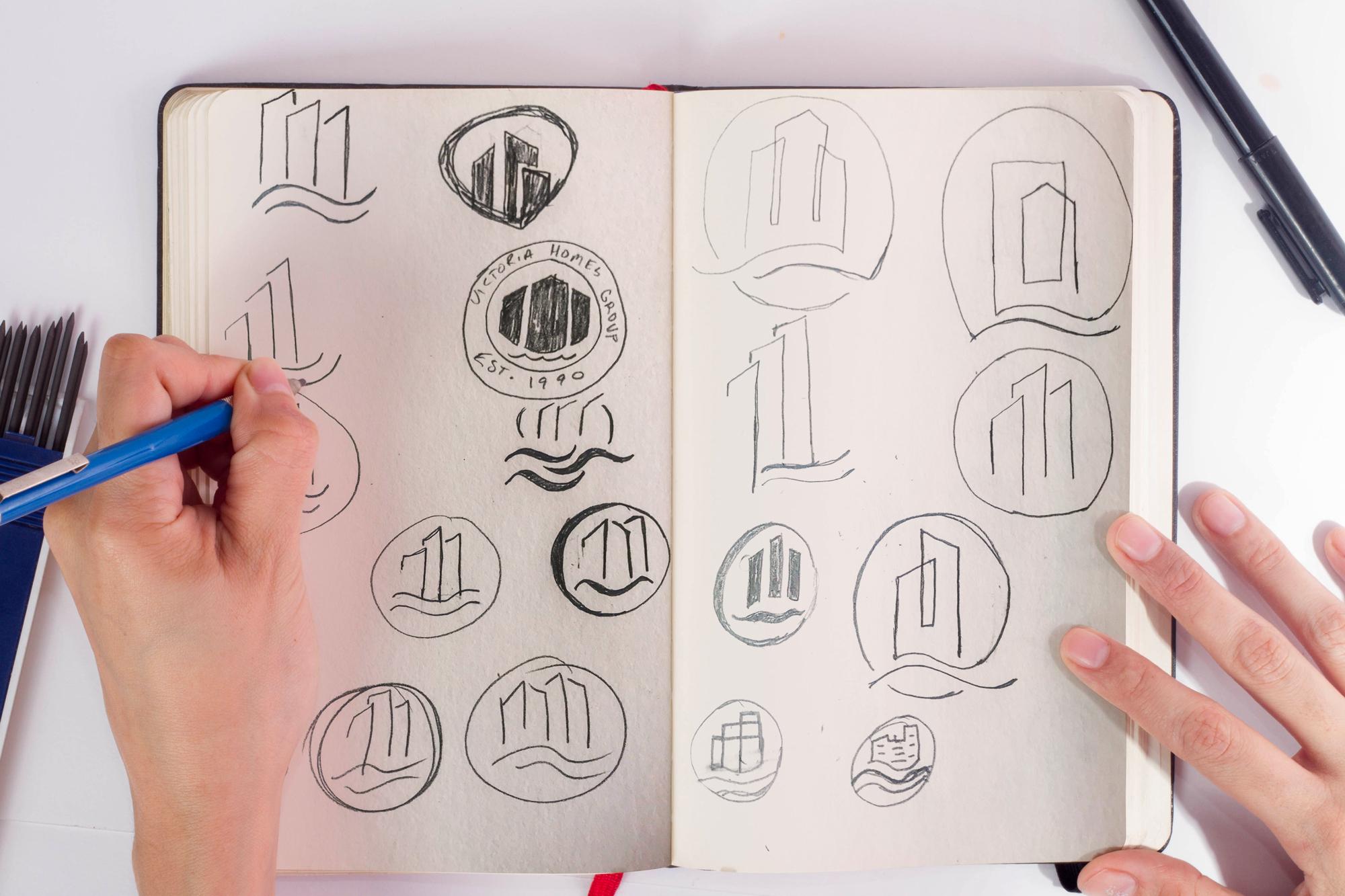 Hand illustrated branding drafts for a unique logo design
